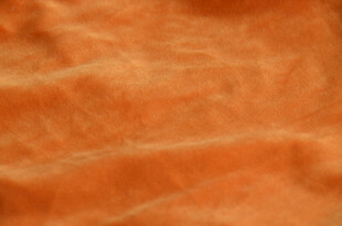 橙色毛绒纹理布料