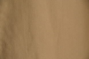 浅棕色布料纹理背景图