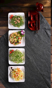 四盘精致菜品展示