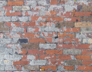 斑驳红砖墙面纹理特写