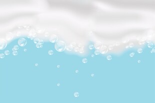 蓝色背景上的牛奶泡沫