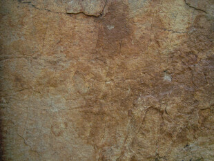 粗糙斑驳的陈旧石墙纹理