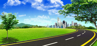 蜿蜒公路旁的城市与绿野