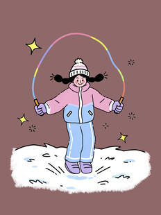 雪地中快乐跳绳的女孩