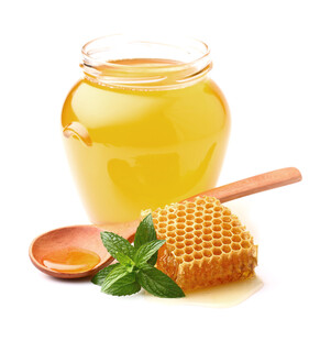 玻璃罐中的美味蜂蜜
