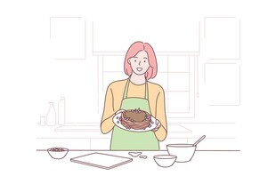 女子厨房捧蛋糕温馨画面