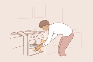 女人从烤箱取食物