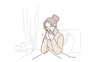 床上女子掩面似情绪低落