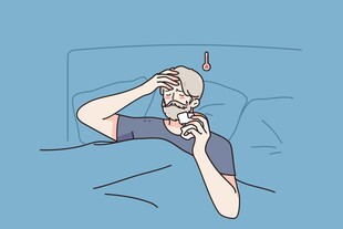 床上男子苦恼地揉眼