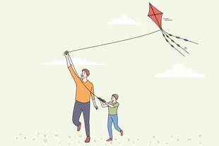 父亲与孩子快乐放风筝