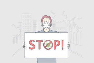 戴口罩者举牌示意停止