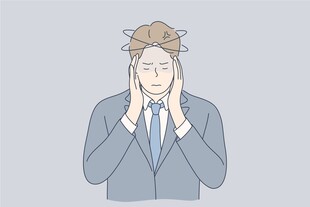 商务人士双手抱头显苦恼