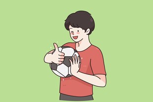 男子抱猫竖大拇指