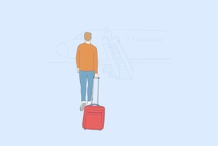 旅行者拖着红色行李箱