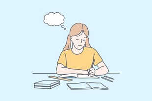 女孩伏案专注书写画面