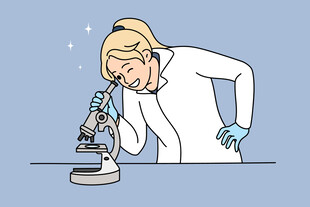 女科学家专注使用显微镜