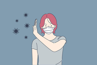 戴口罩女士做防护手势