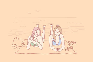 沙滩上的两位比耶女孩