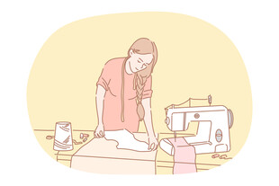 女子专注缝纫机前工作