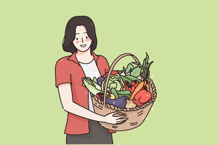 女子手提满载蔬果的袋子