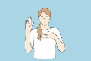 女性比出停止手势示意