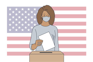 美国女性戴口罩进行投票