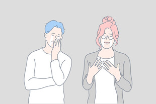 男女手持手机专注模样