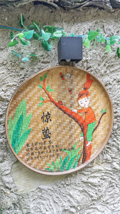 竹编装饰盘上的花鸟图案