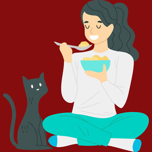 女孩与猫温馨共餐时刻