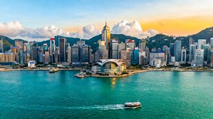 香港维港航拍黄昏渡轮与会展中心