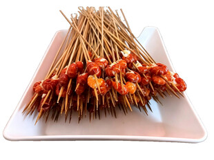 堆叠的腌制生肉串